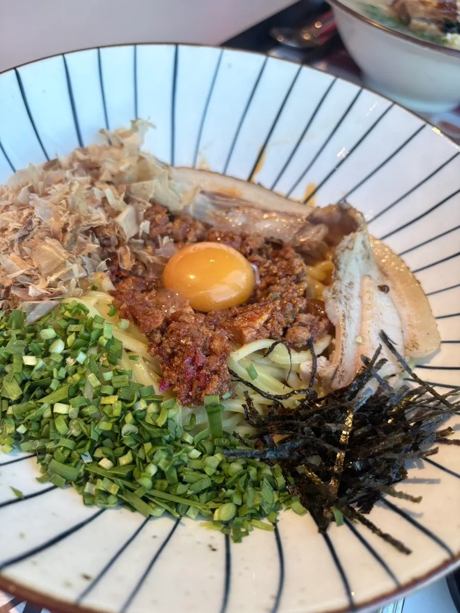 Pork belly mazesoba topped with a variety of ingredients