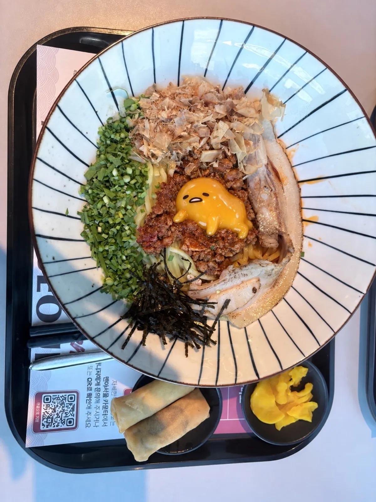 Close-up of the egg yolk in the center of the mazesoba