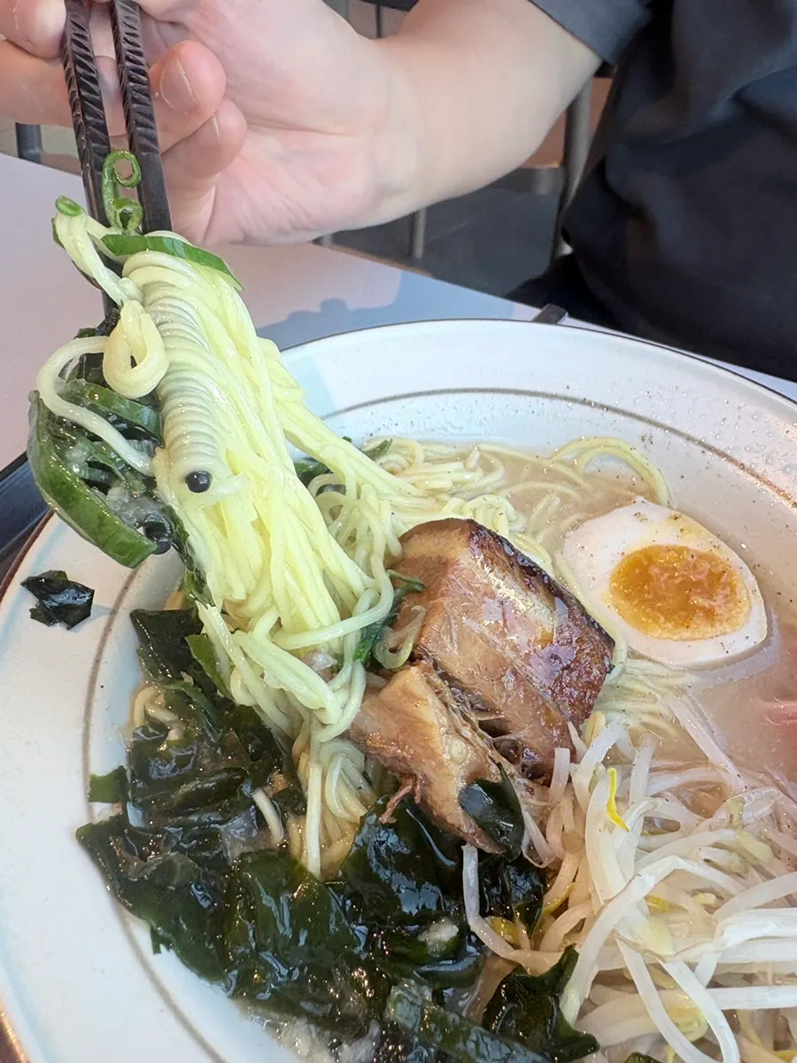 Sharing a bite of ramen together