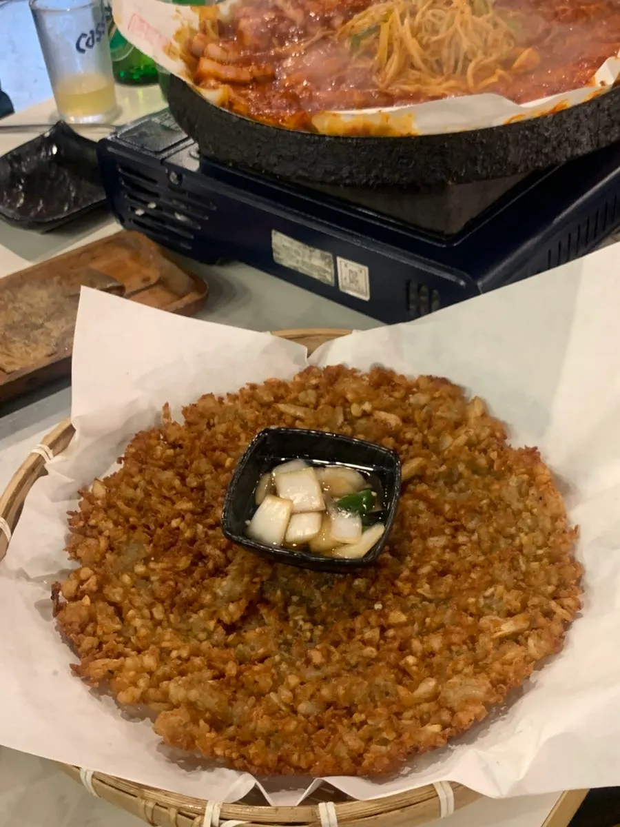 Crispy-outside-chewy-inside potato pancake fried to a golden brown