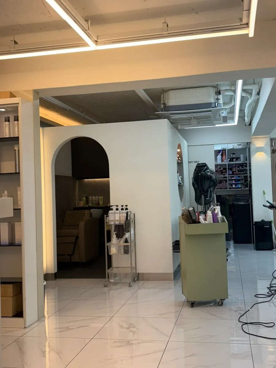 Row of styling chairs inside the salon