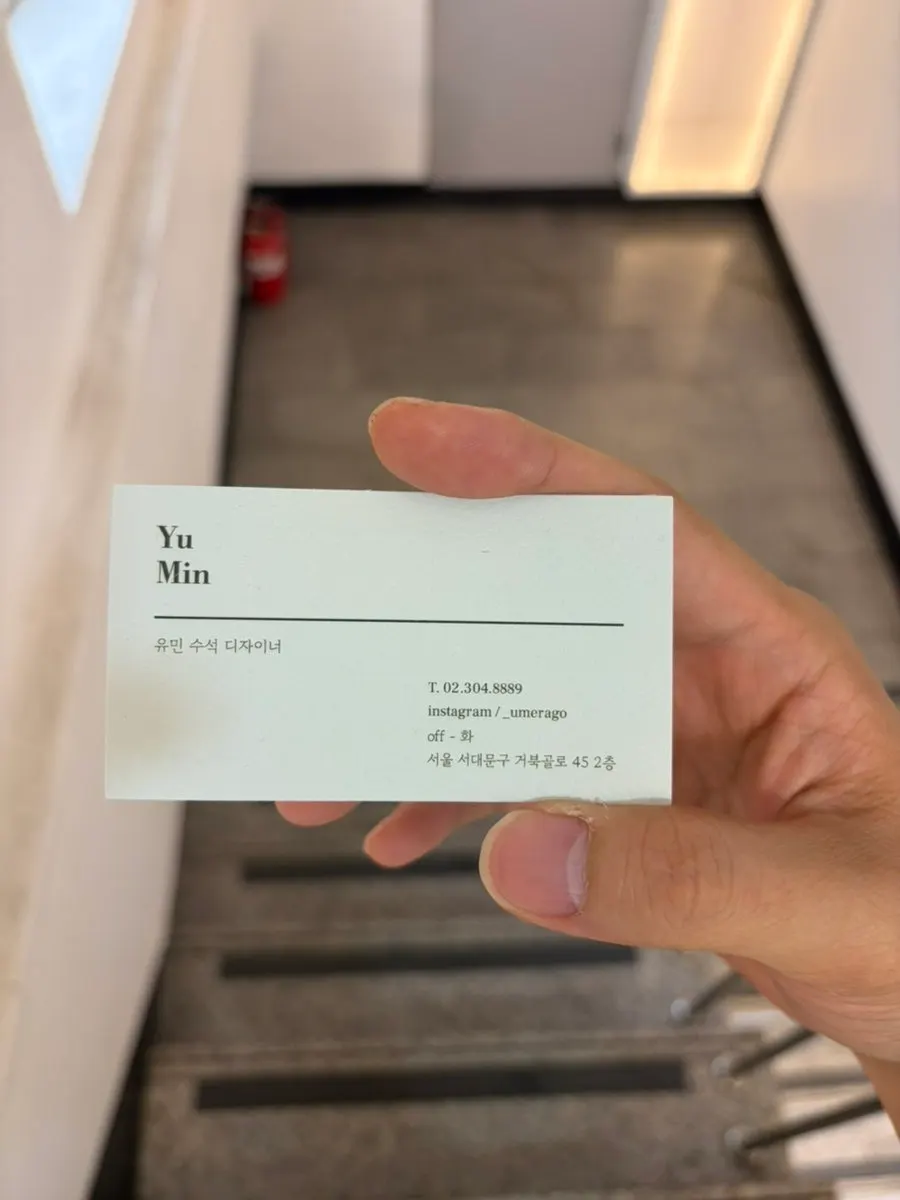 Senior Designer Yumin, who handled the down perm
