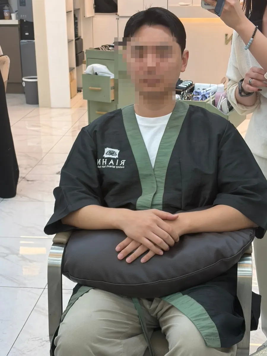 Side view of the down perm connected to the head shape