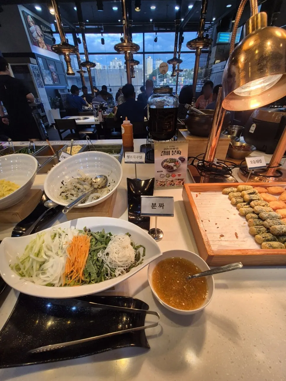 Global Galbi Festa station for galbi bun cha, fondue, and tacos