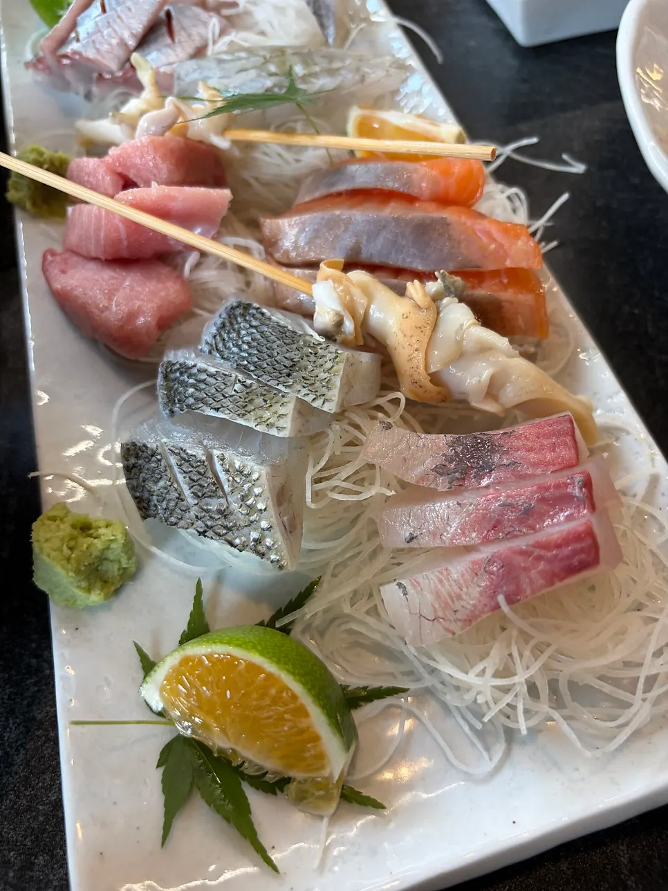 Abalone served with the mixed sashimi