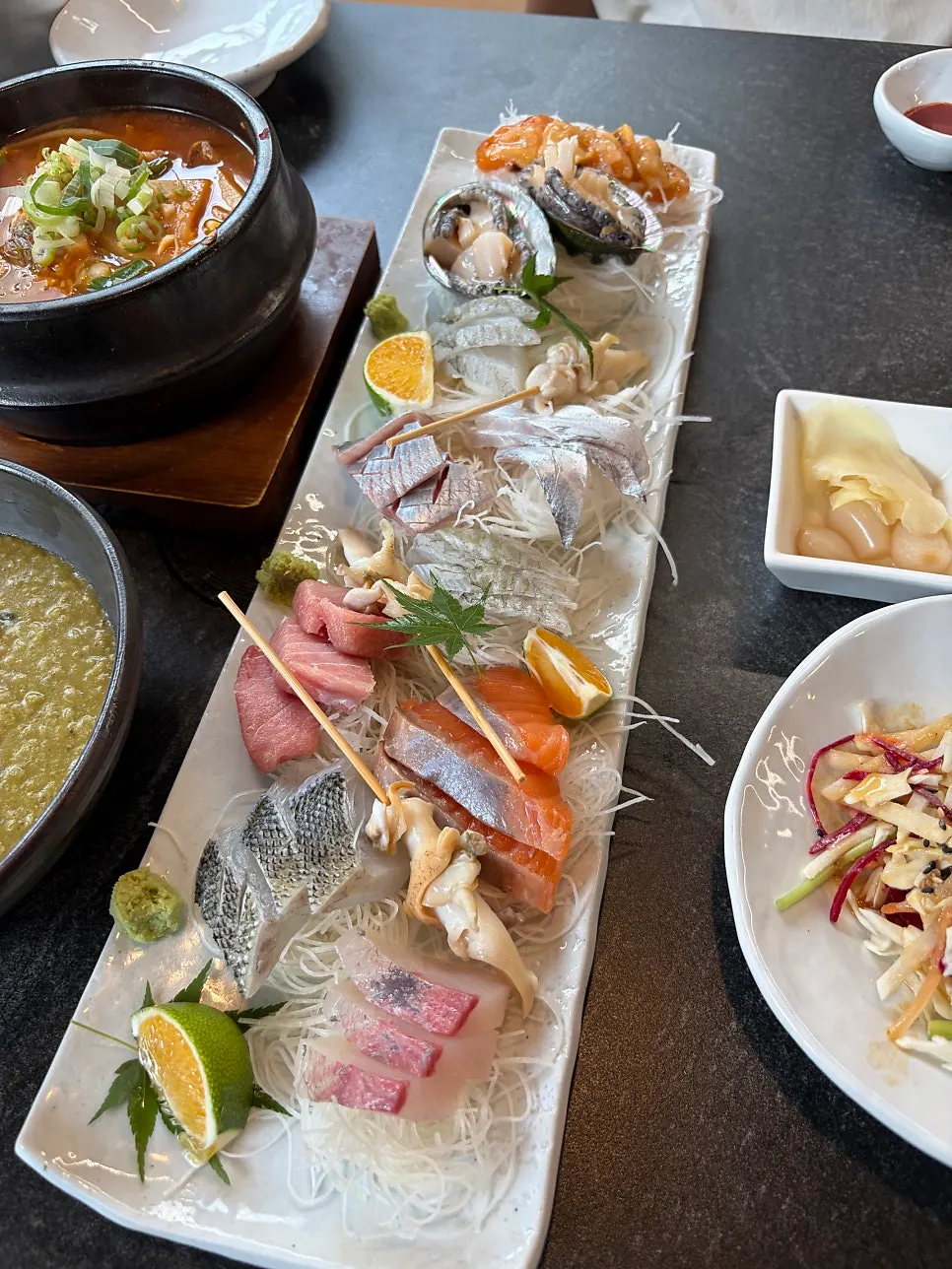 Picking up a piece of sashimi