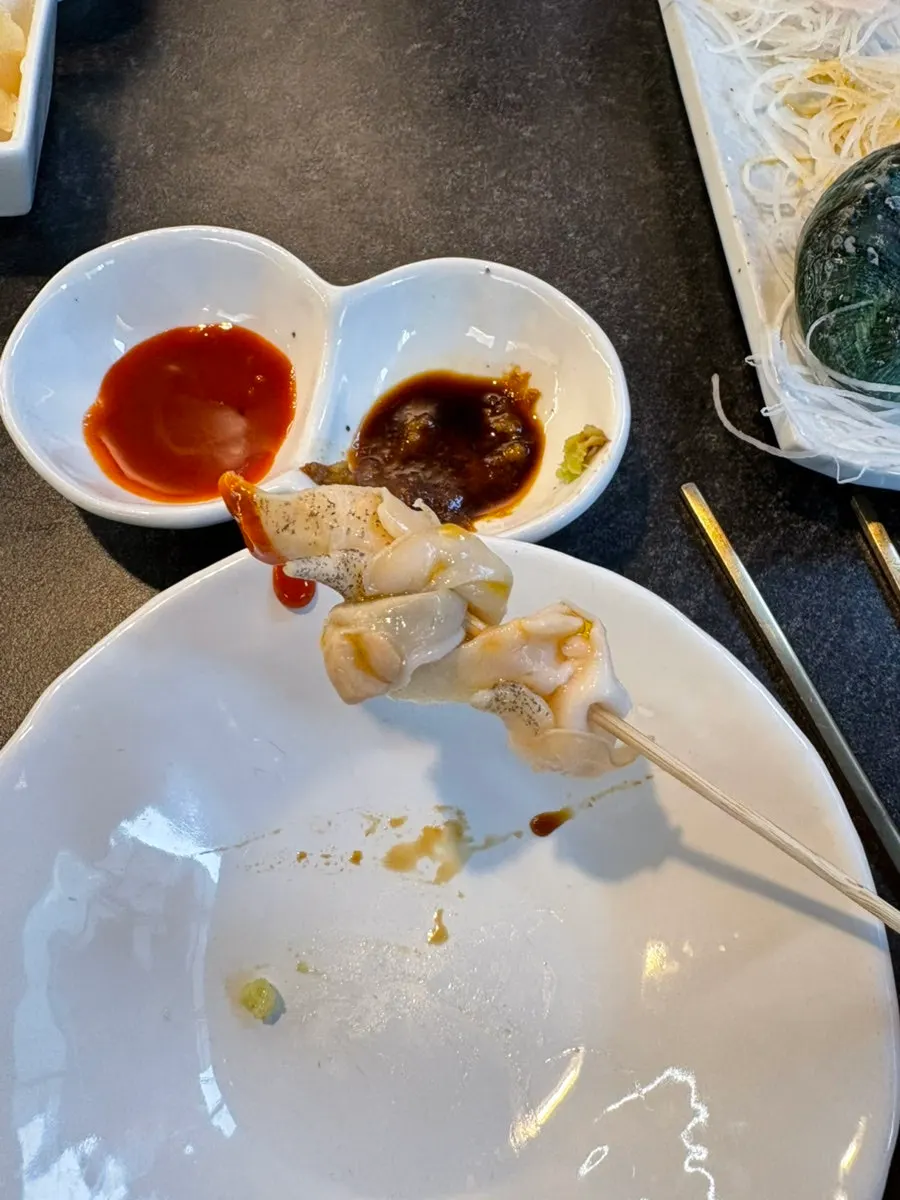 Plate of assorted sashimi with several kinds of raw fish