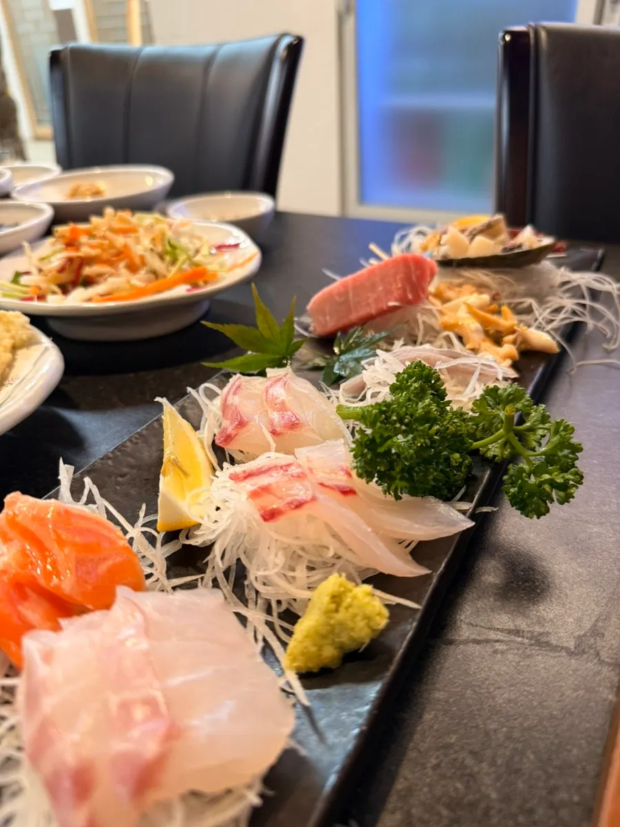 Seafood plate with abalone sashimi and sea squirt