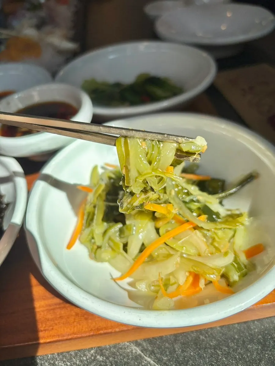 More side dishes continuing to arrive at the table