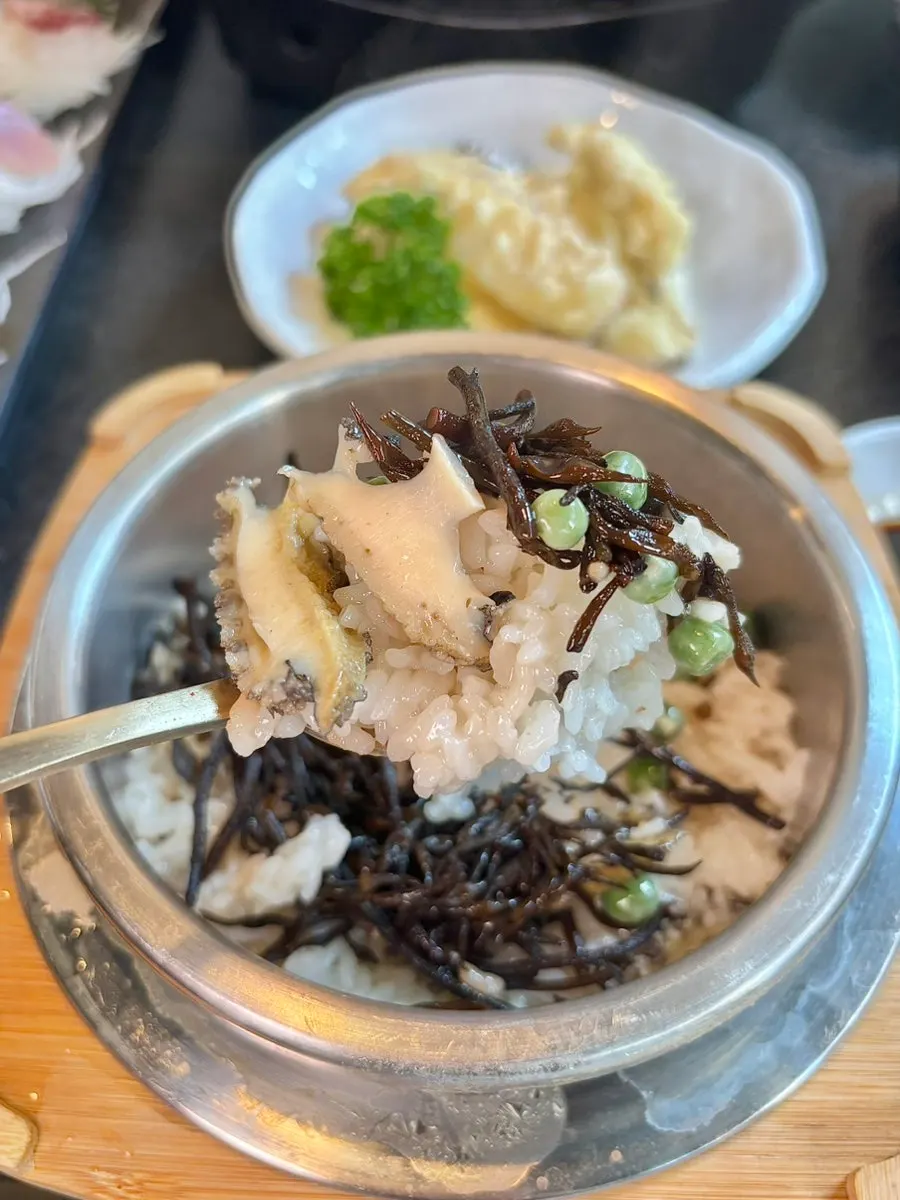 Plate of conch, abalone, and other seafood
