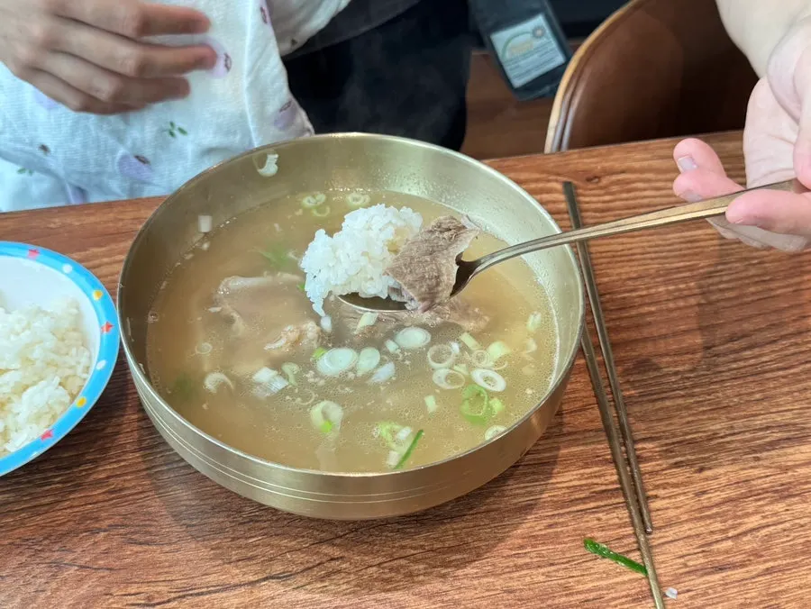 Galbitang served with a bowl of rice