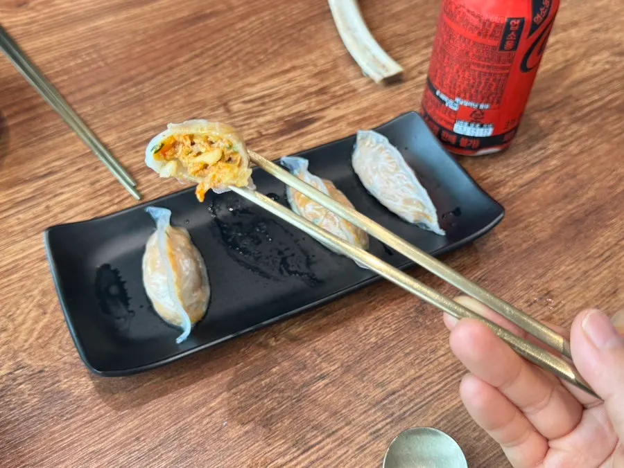 Octopus mandu cut in half showing the filling