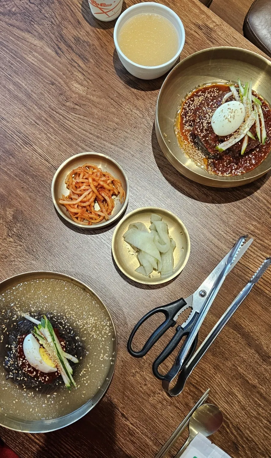 Chewy kudzu noodles lifted from the mul naengmyeon