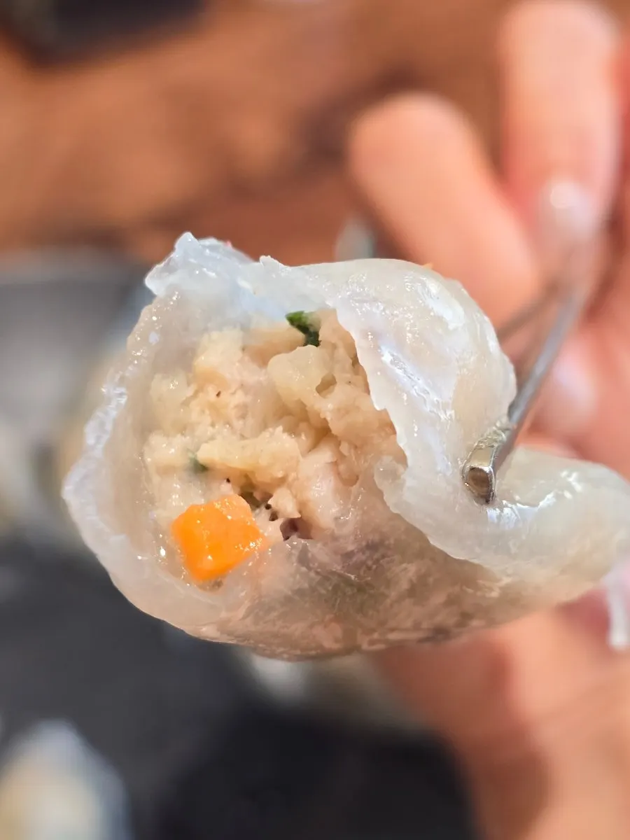 Close-up of bibim kudzu naengmyeon mixed with sauce