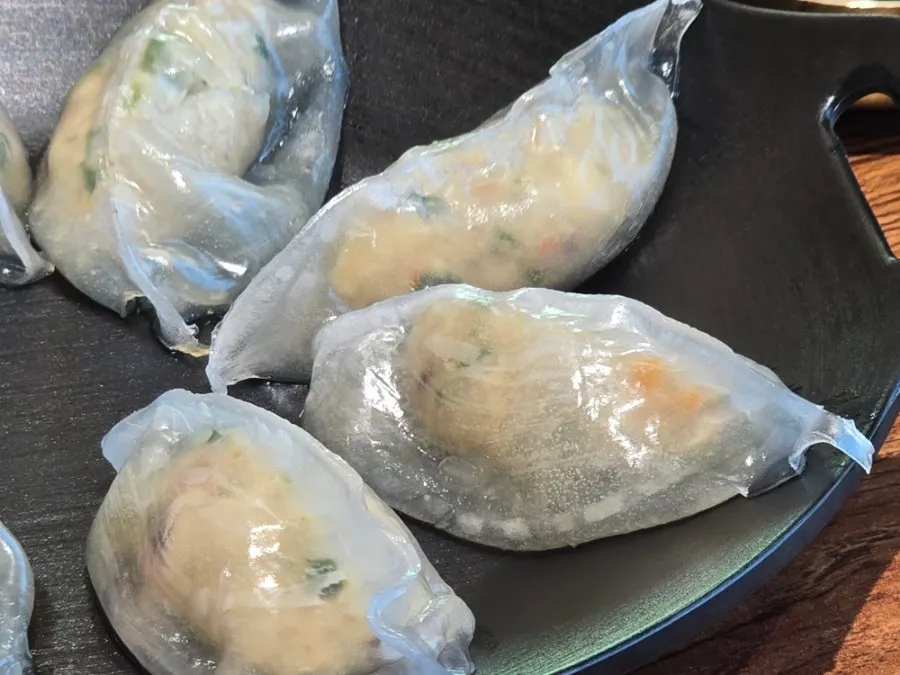 Octopus mandu served alongside naengmyeon
