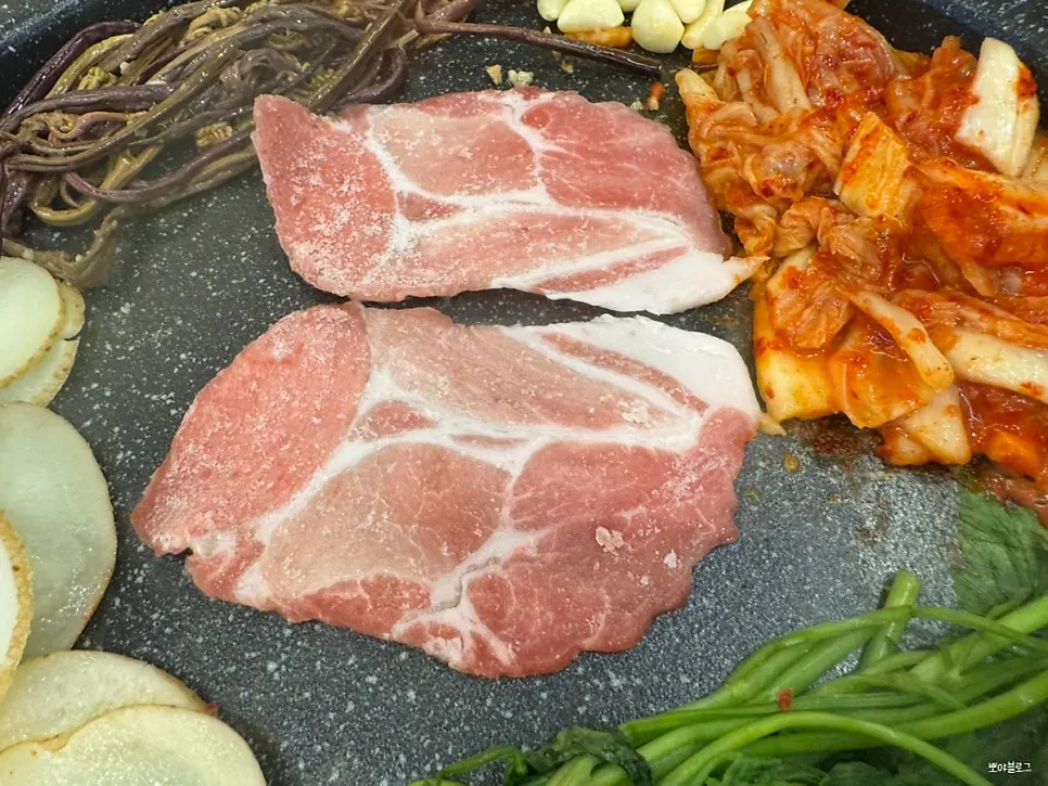 Table setting with side dishes and stew
