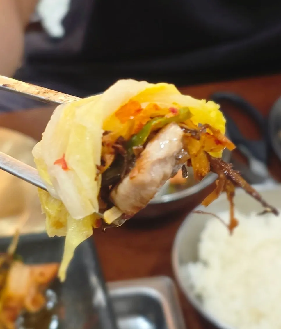 Napa cabbage kimchi grilled with pork belly on the pan