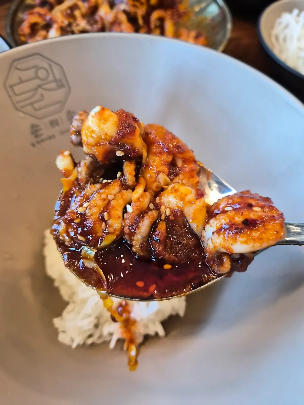 Stir-fried webfoot octopus served at the table