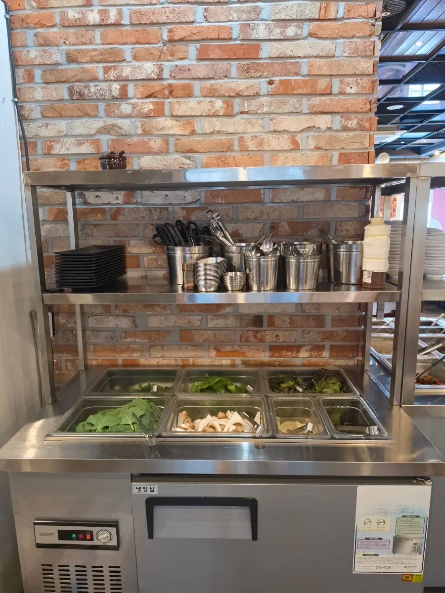 Side dishes and sauces at the self-bar