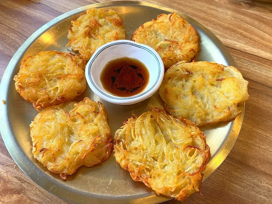 A plate of crispy-chewy potato pancake