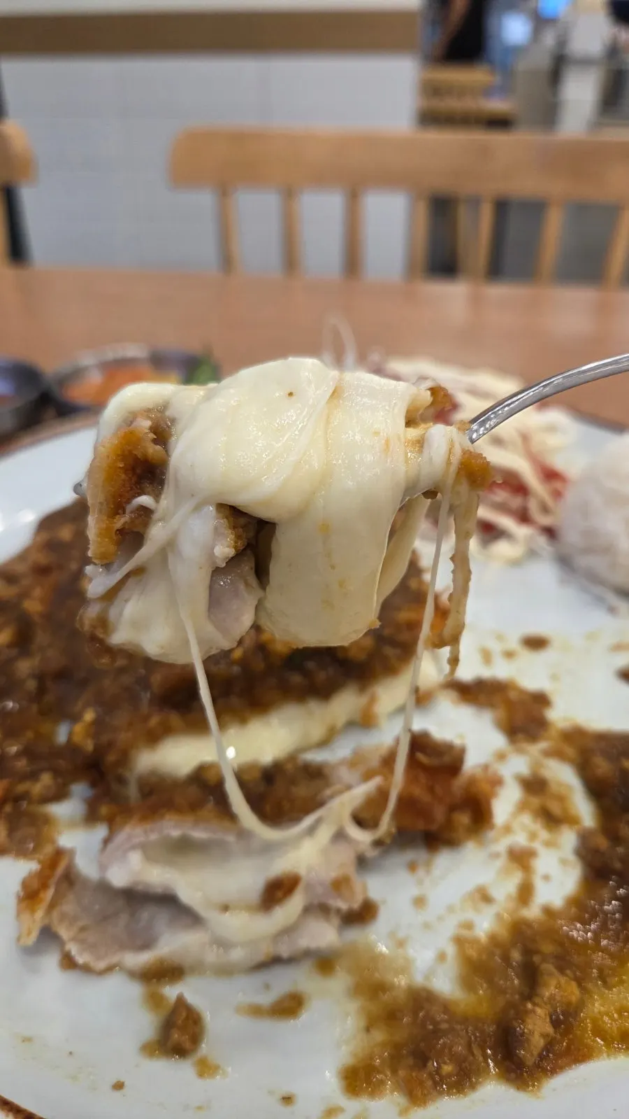 Pork cutlet with cheese and curry sauce