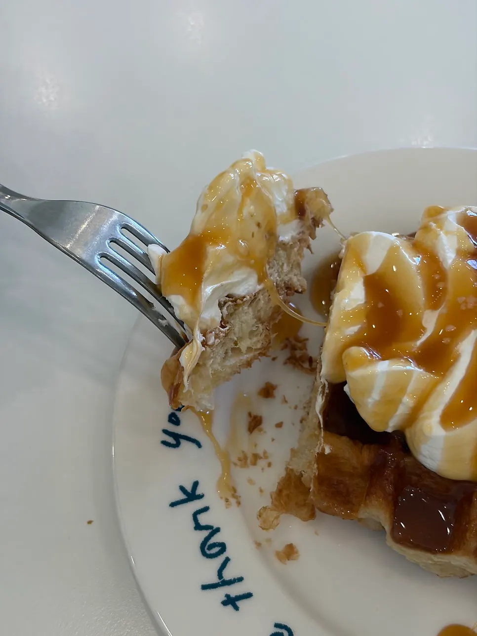 Cross-section of the salt caramel croffle cut open