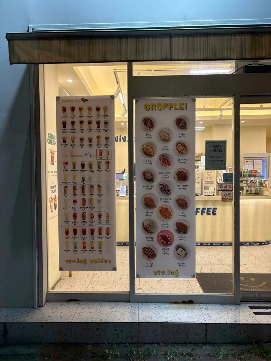 Café exterior showing coffee and croffle menu