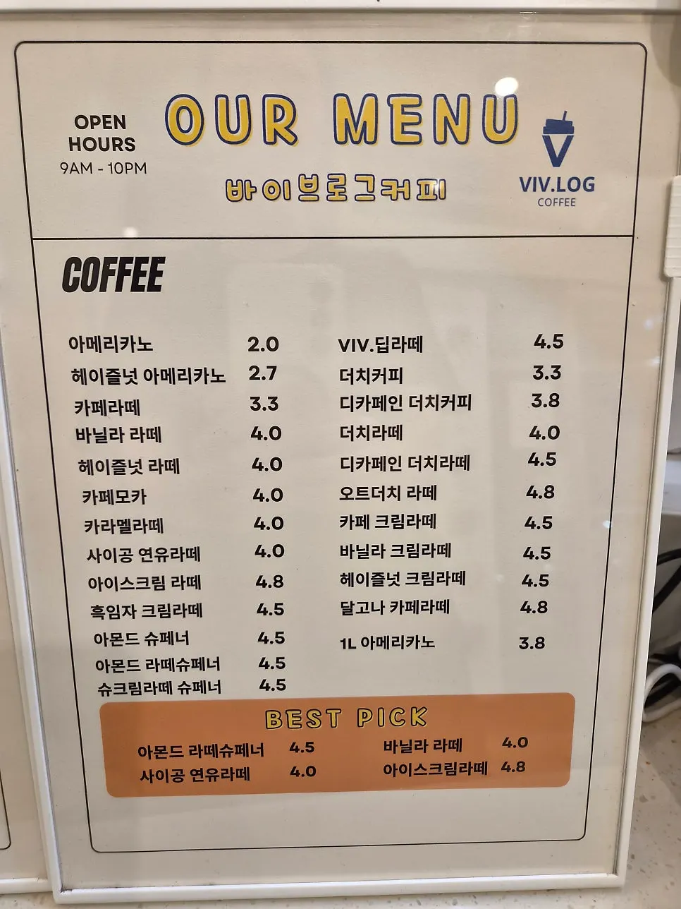 Menu board showing fresh fruit juice and ade