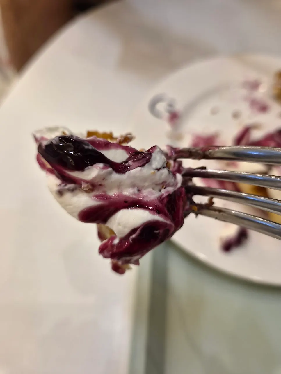 Cross-section of a freshly baked croffle with blueberry yogurt cream