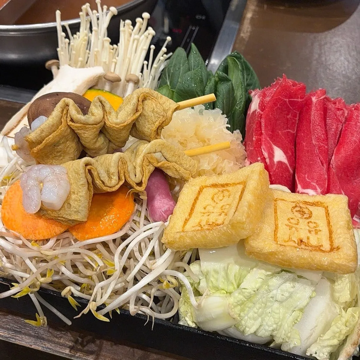 Plate of beef pork neck served with vegetables
