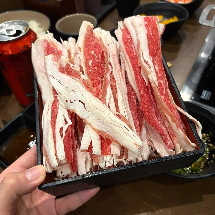 Shabu-shabu meat dipped in the handmade tarae sauce
