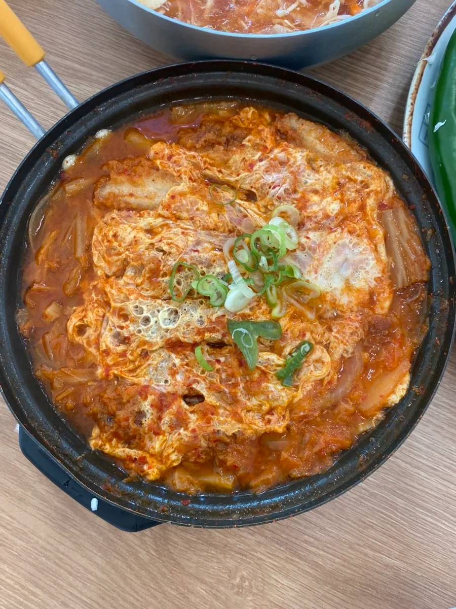 Cheese flowing out of a pork cutlet