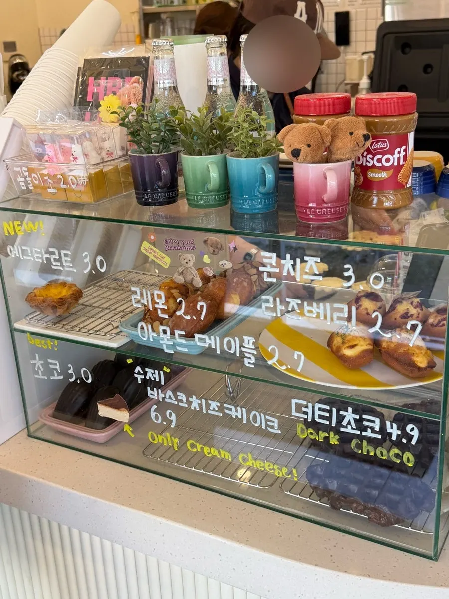 Dessert menu board with croffles and egg tarts