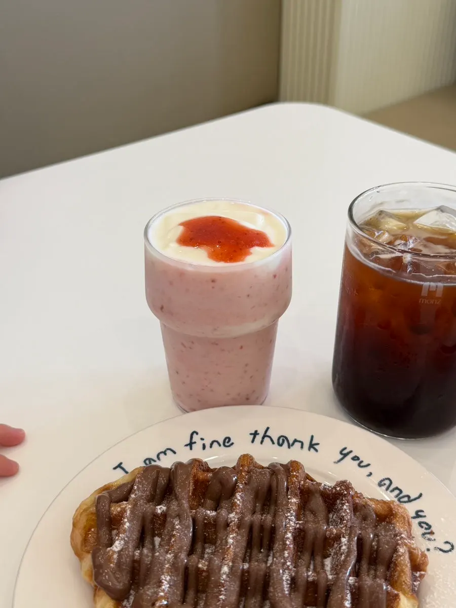A glass of real strawberry yogurt