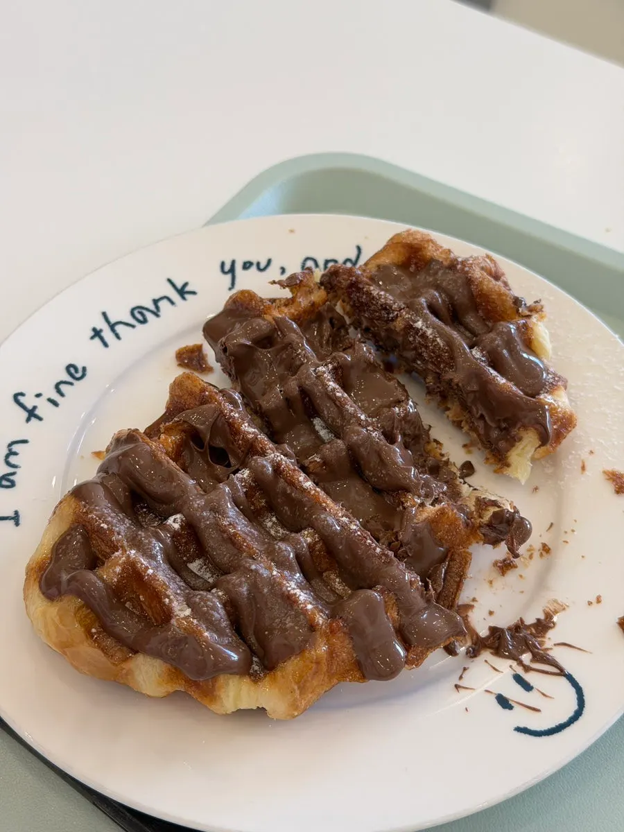 Cross-section of Nutella croffle with coffee
