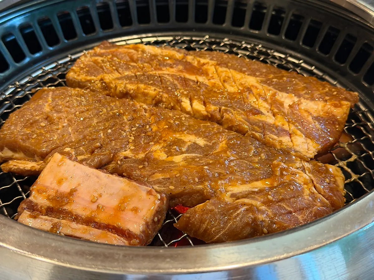 Two servings of crosshatched hwangchil wang galbi