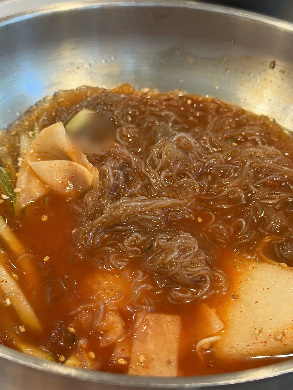 Close-up of the chewy bibim naengmyeon noodles