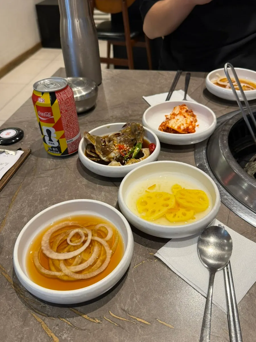 Table set with ordered hwangchil pork galbi and side dishes