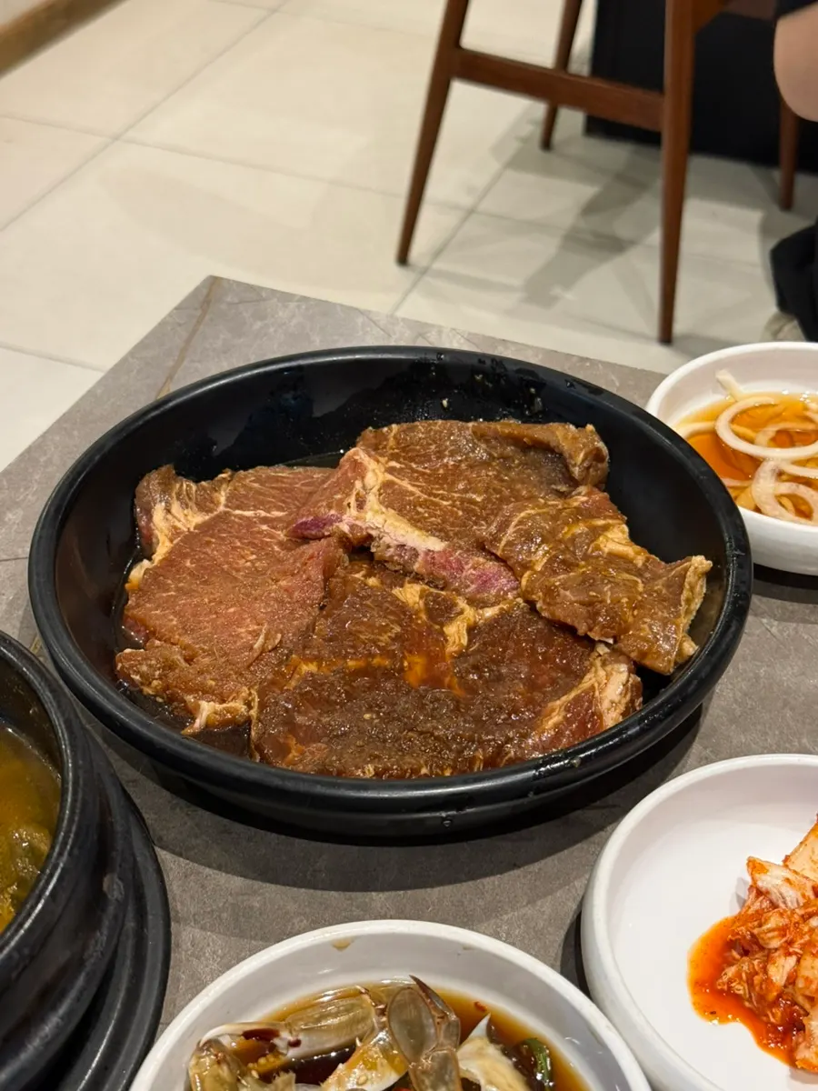 Full spread of pork galbi with lettuce wraps