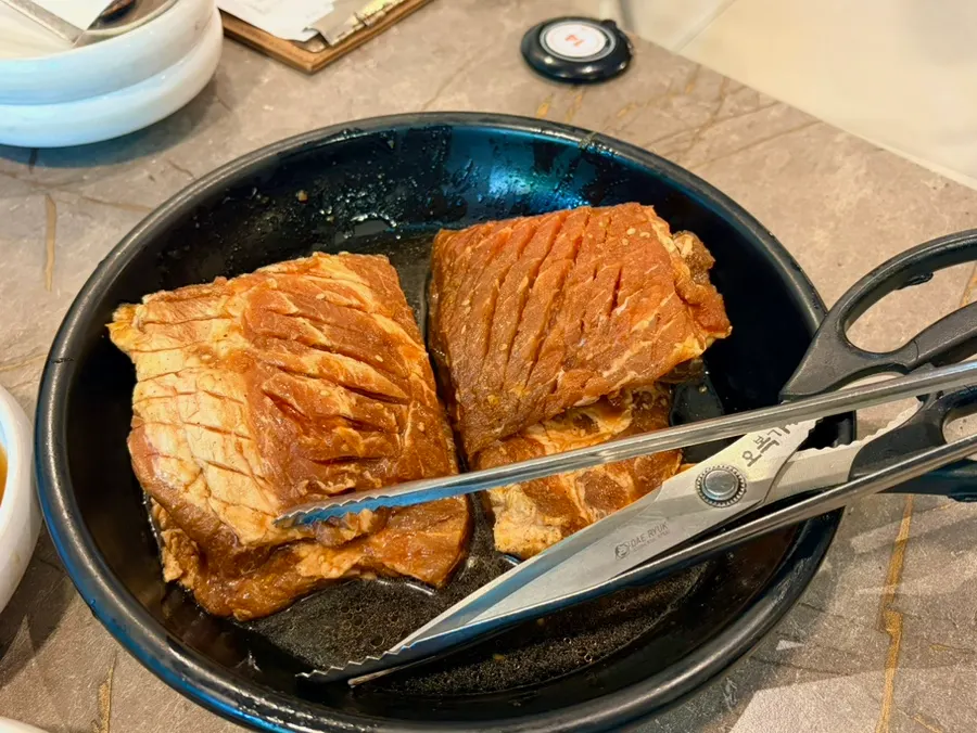 Table setting with two servings of hwangchil king galbi