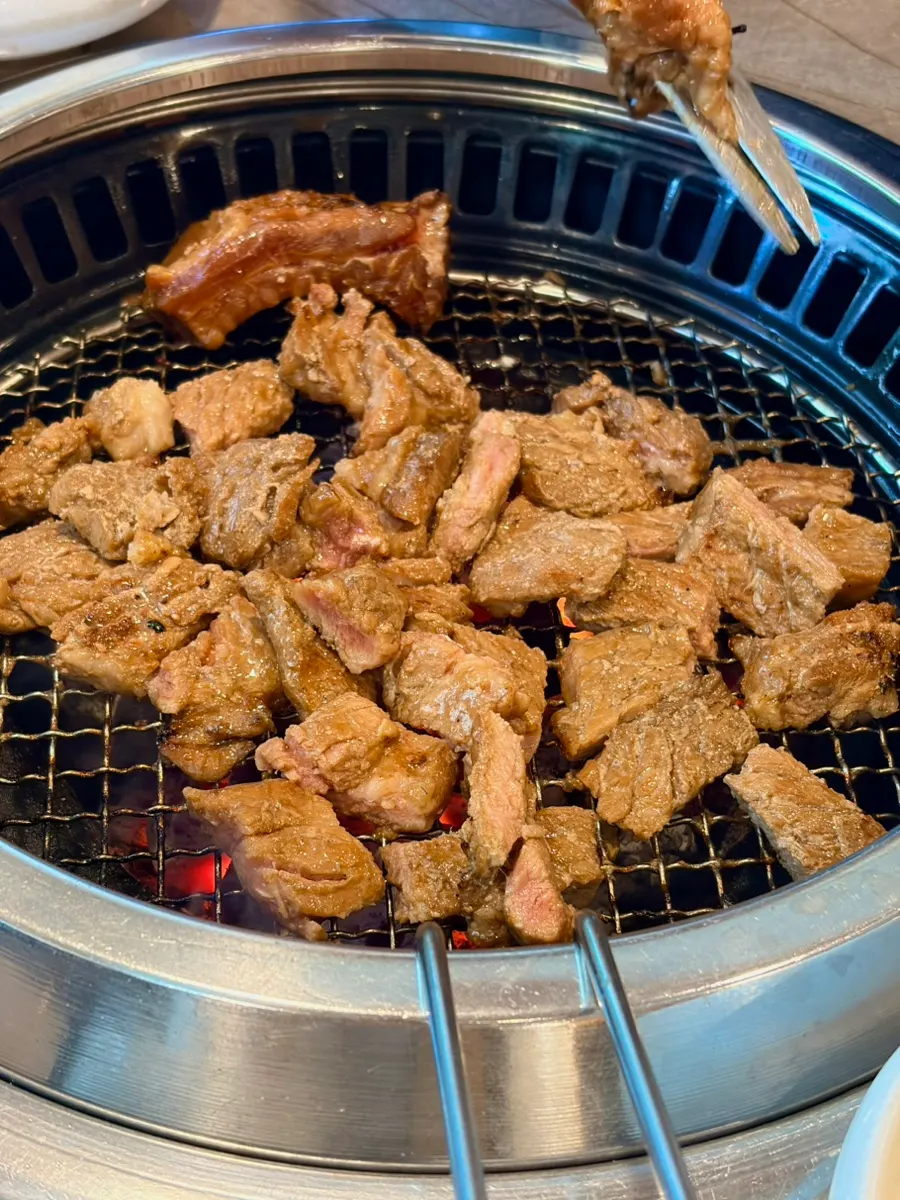 Grilled ribs cut with scissors