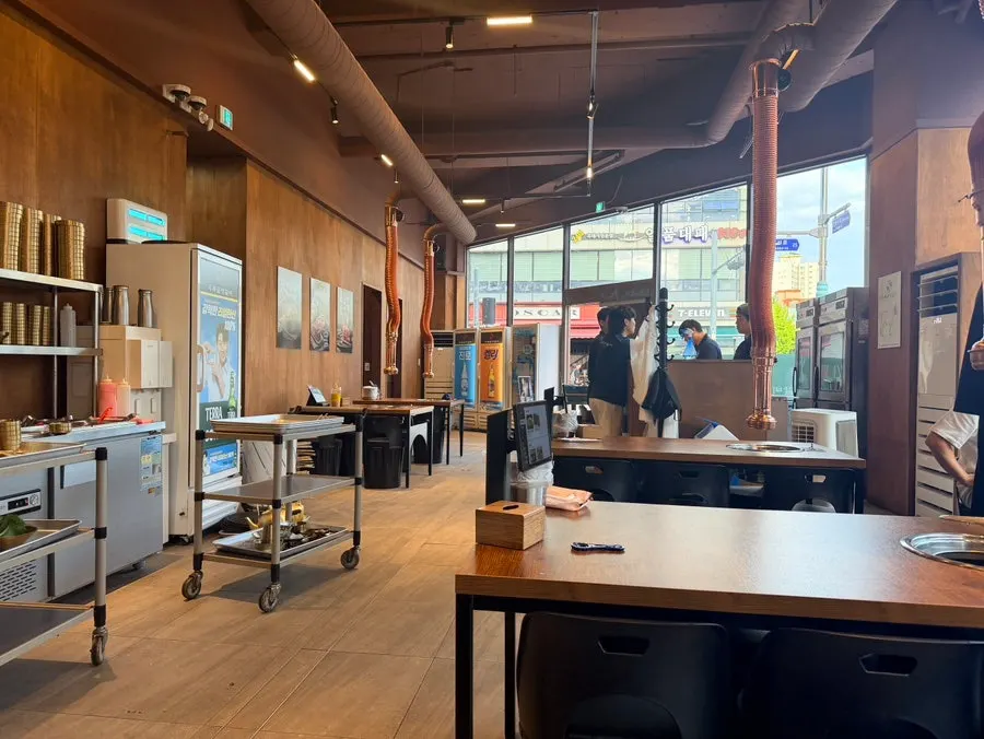 Restaurant interior with 4-person and 6-person tables