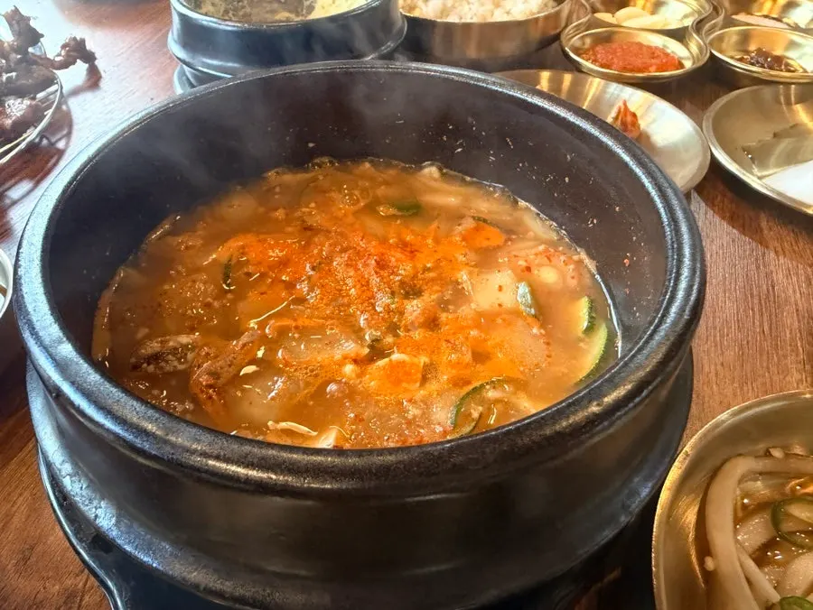 Eating crab jjiglae with rice