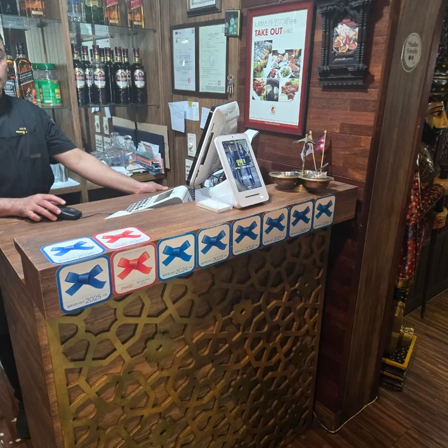 Blue Ribbon mark displayed in the restaurant