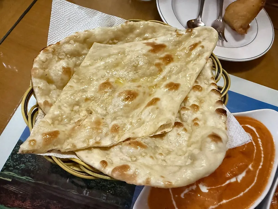 Naan baked to a glossy finish