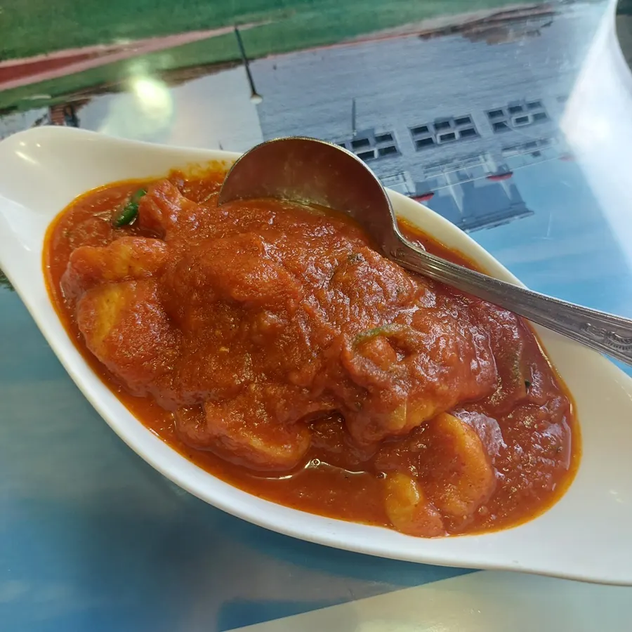 Shrimp vindaloo curry chosen instead of vegetable curry