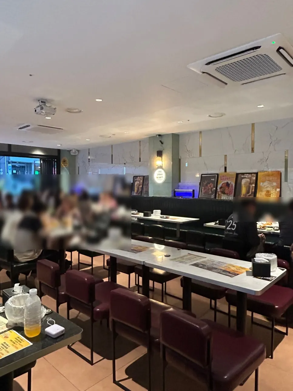 Spacious, clean indoor seating at Kkanbu Chicken