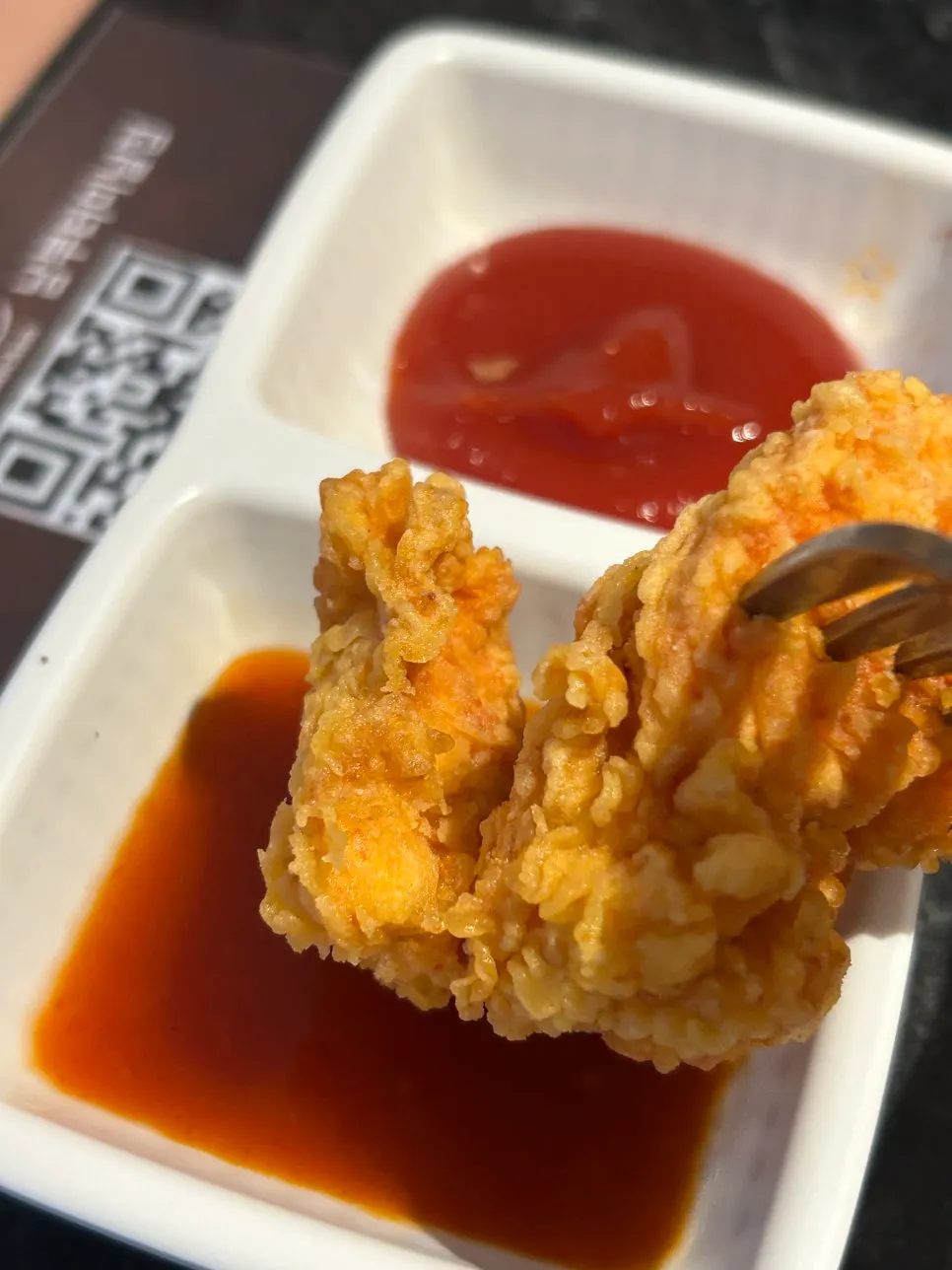 Cross-section of a bitten piece of boneless chicken