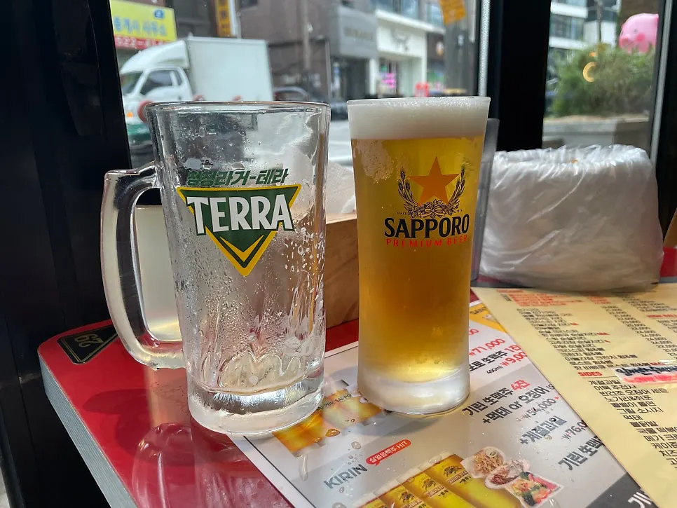 An additional order of Sapporo draft beer