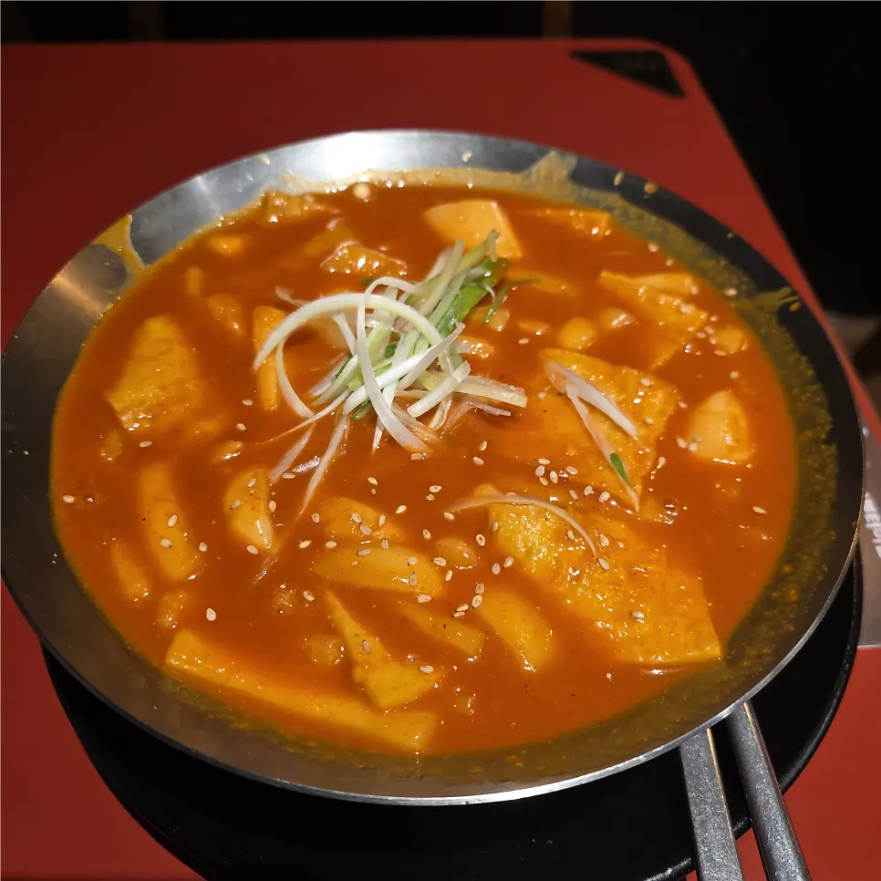 Crispy Curry Wing & Drumette Pieces paired with tteokbokki